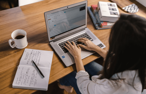 lady using a chromebook